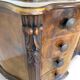 serpentine commode in antique walnut