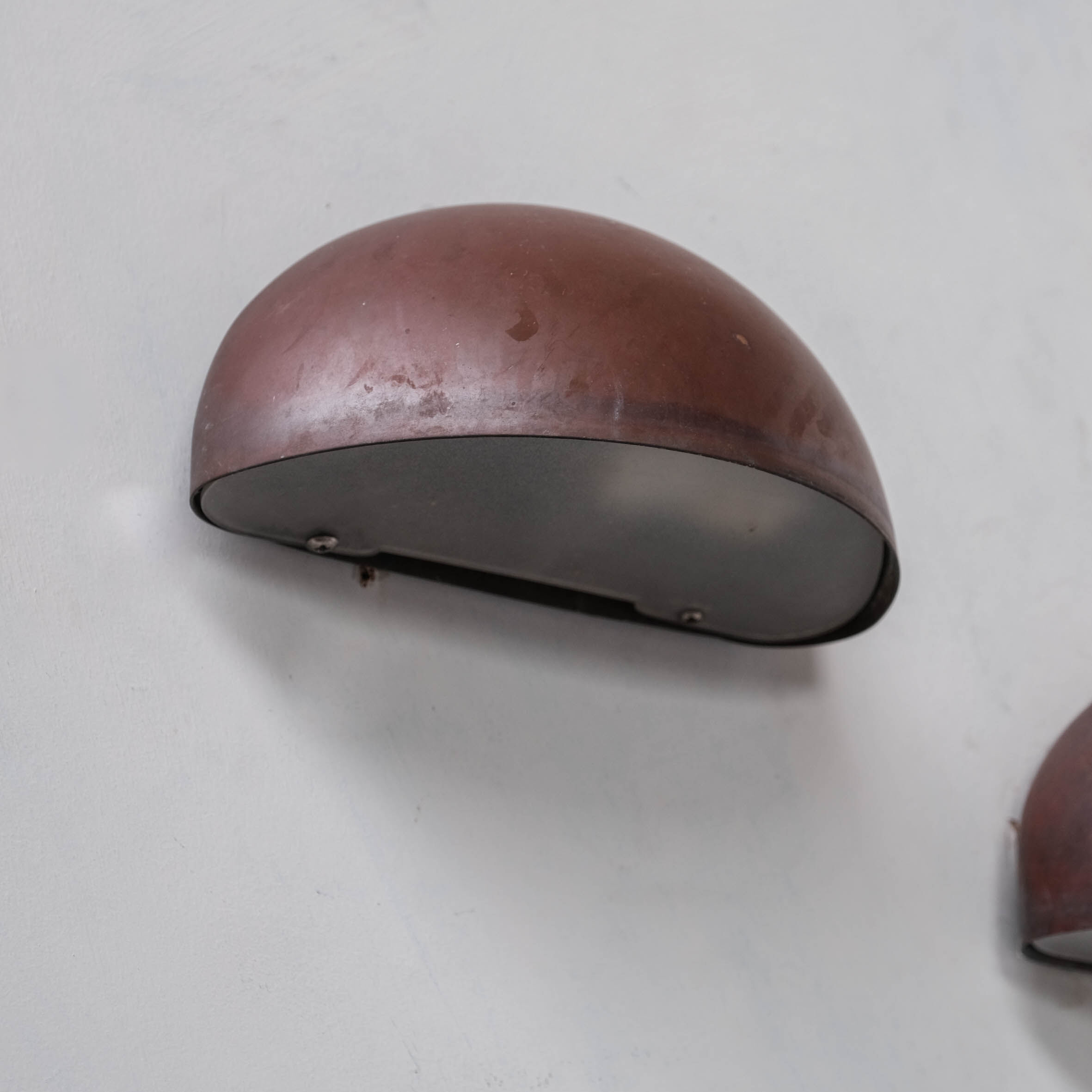 Pair of danish copper patinated wall lights