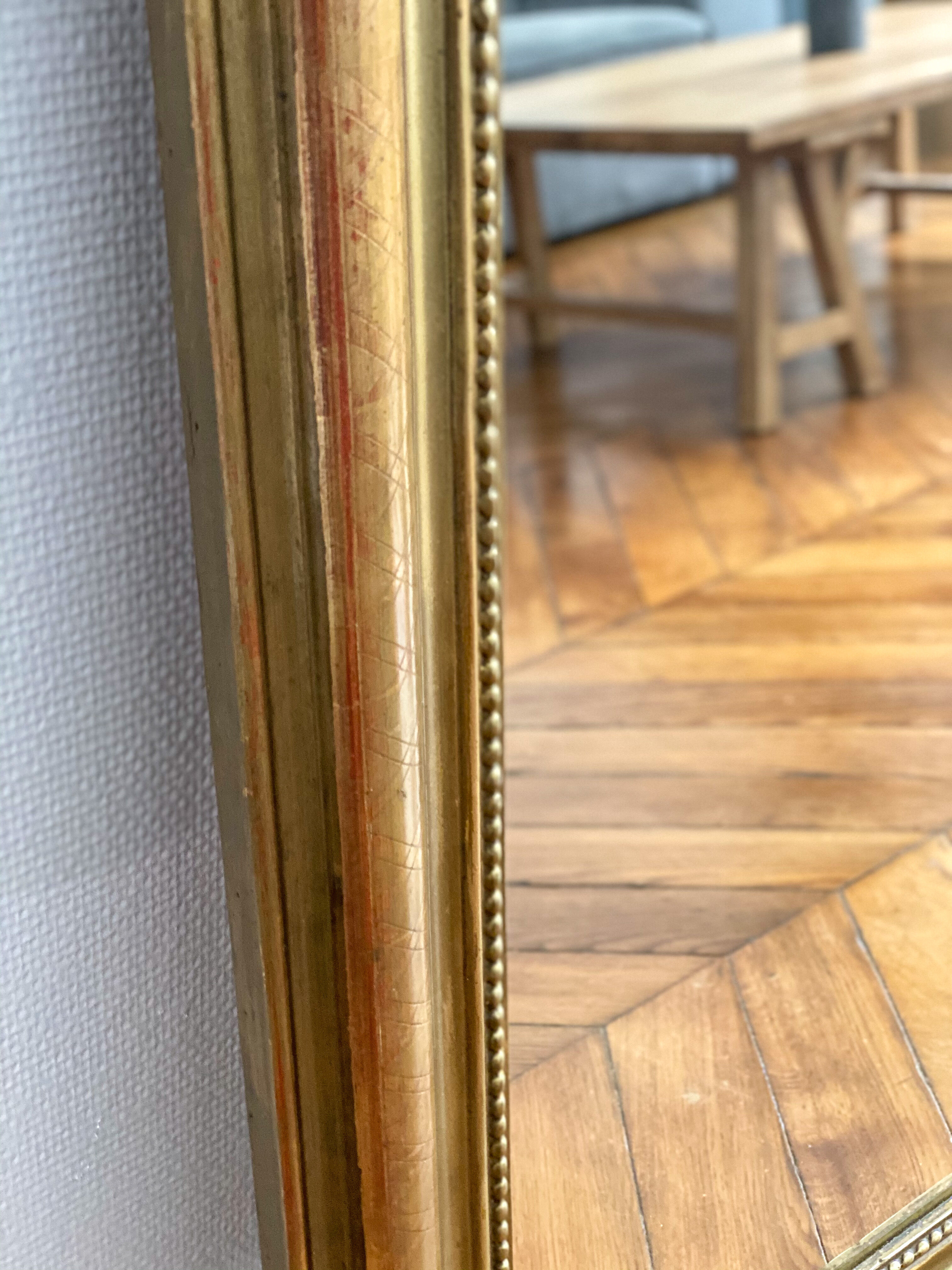 Miroir Louis Philippe perlé doré sculpté 74x98cm