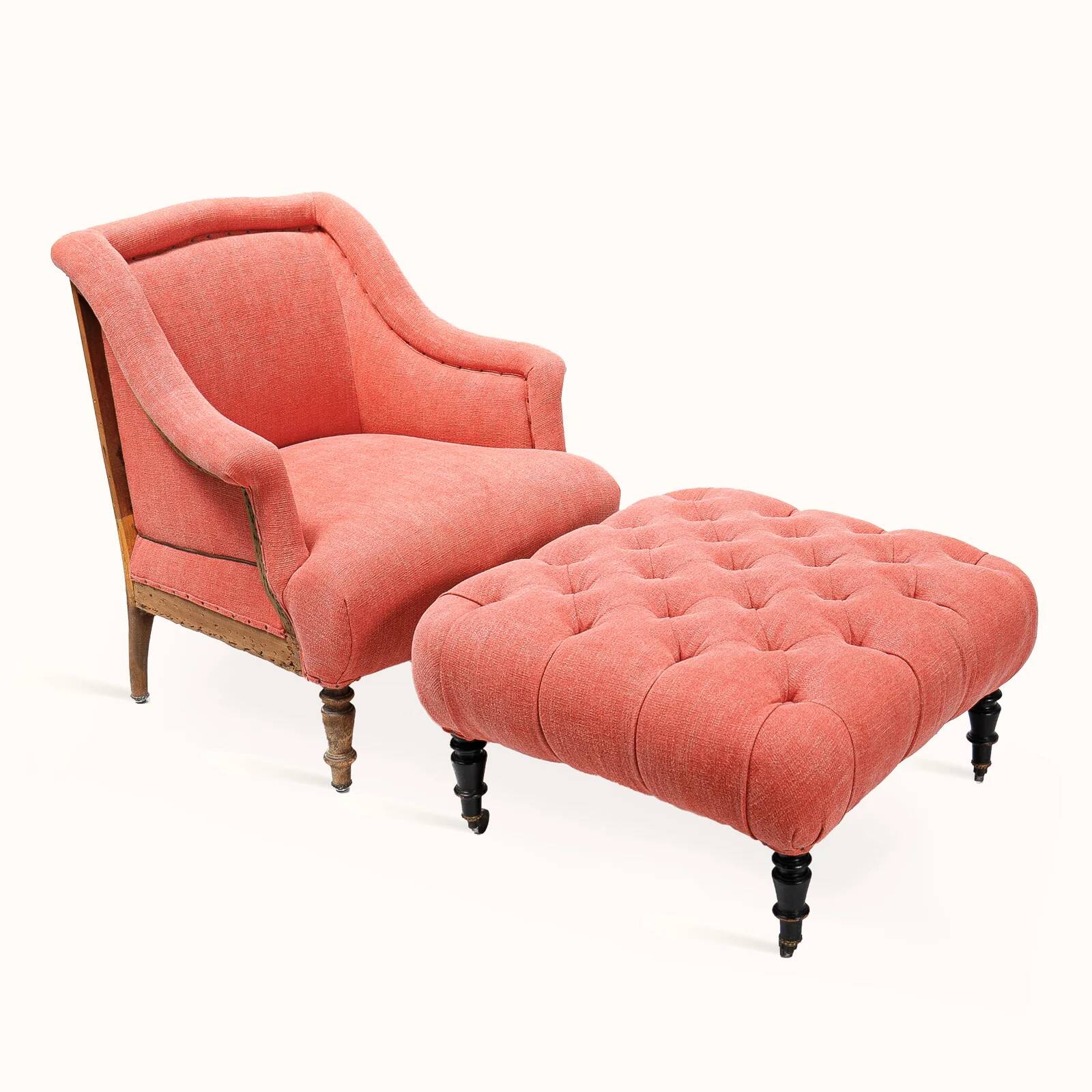 Napoleon III salon armchair in brick red linen with a tufted footrest.