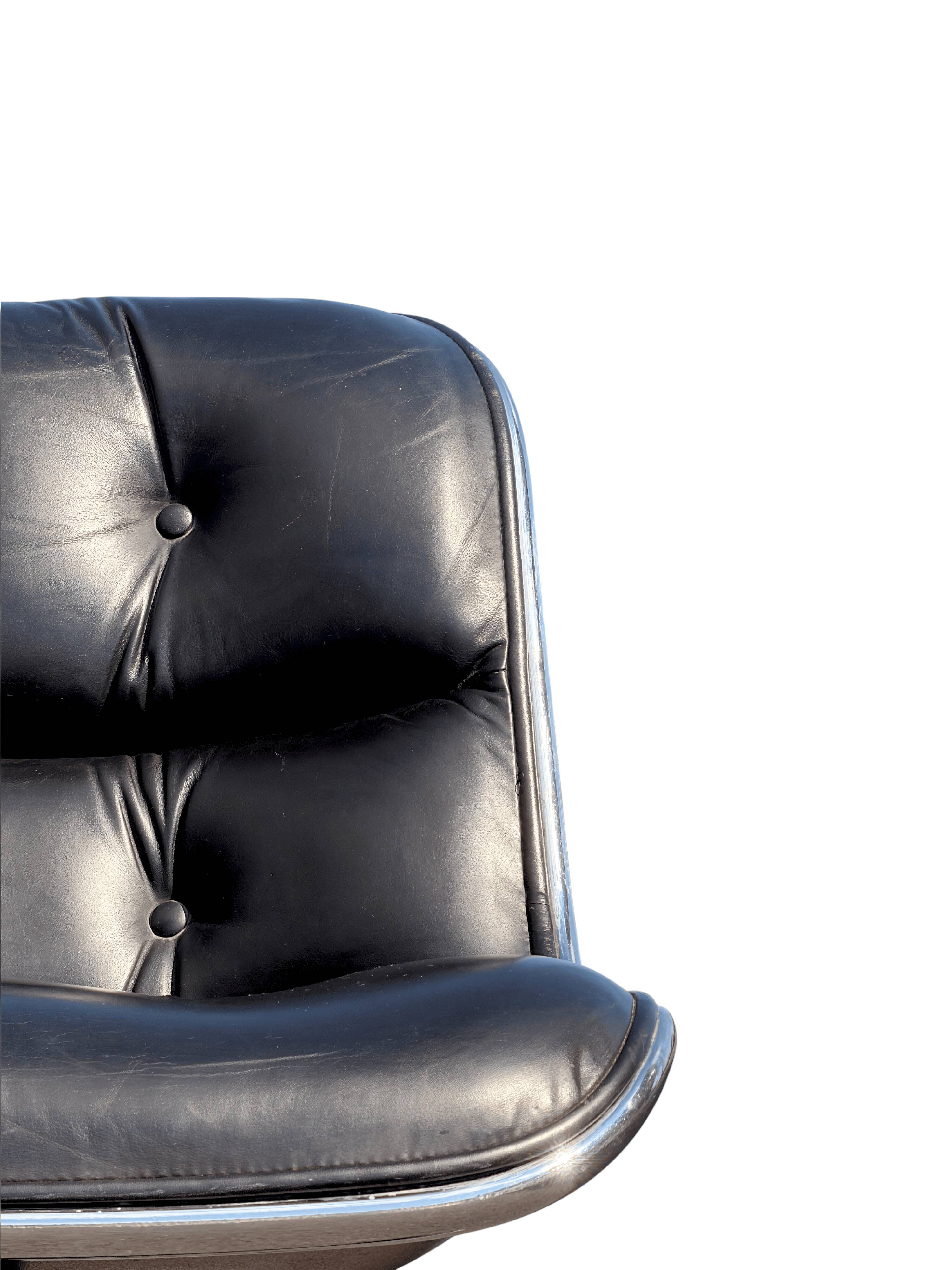 Charles Pollock Knoll office chair in black leather without armrests.
