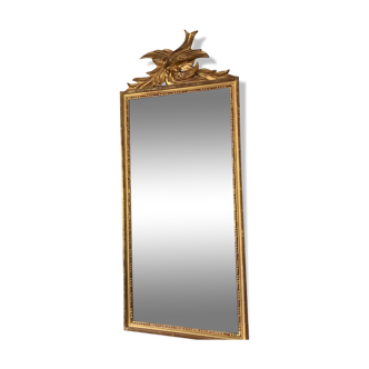 Old mirror in gilded wood