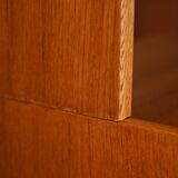 Vintage bookcase with storage compartment