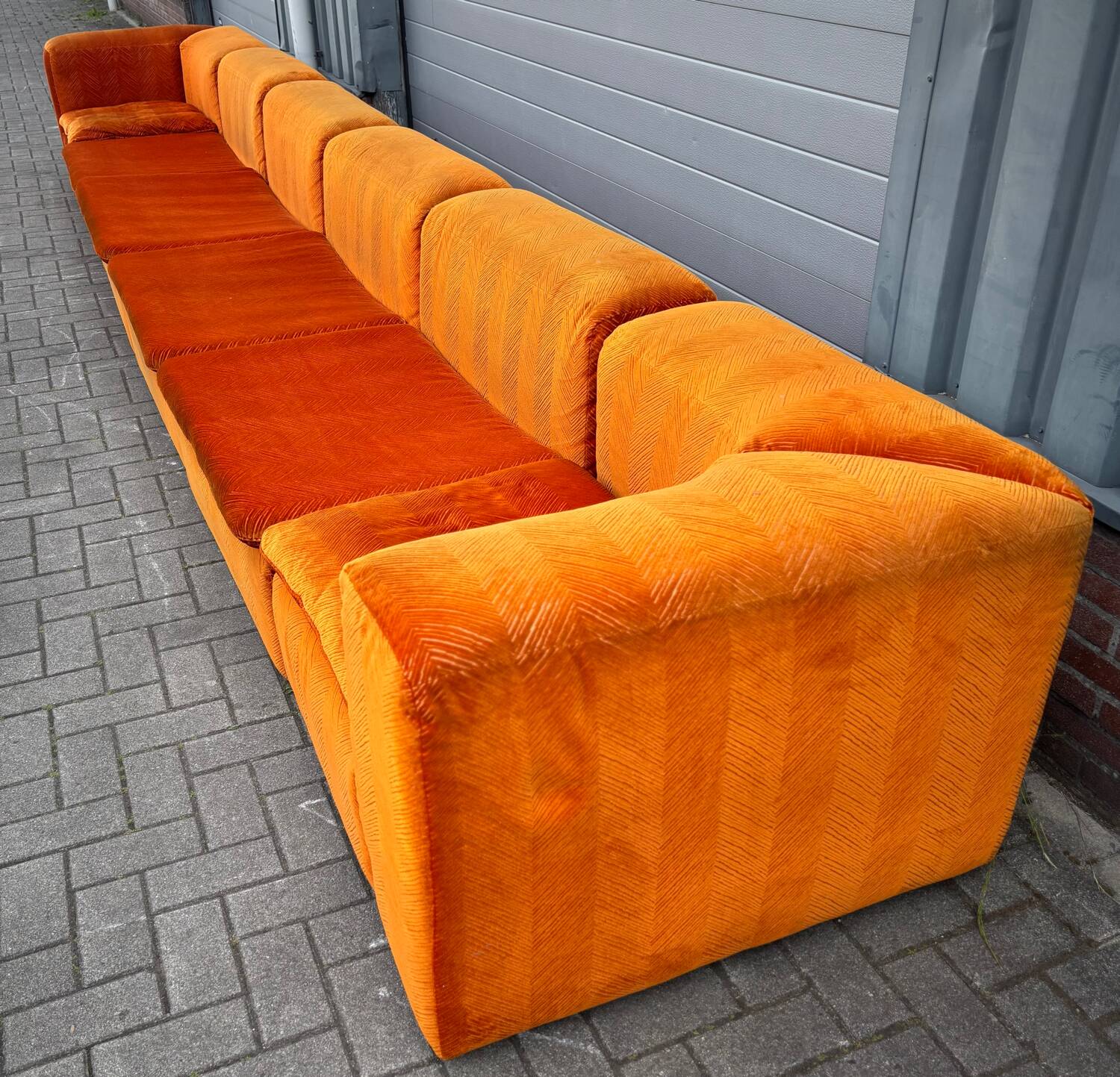 Large Mid Century sectional sofa of 6 elements in orange velvet
