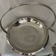 Modernist table basket in 18/10 stainless steel by Jan Couzon