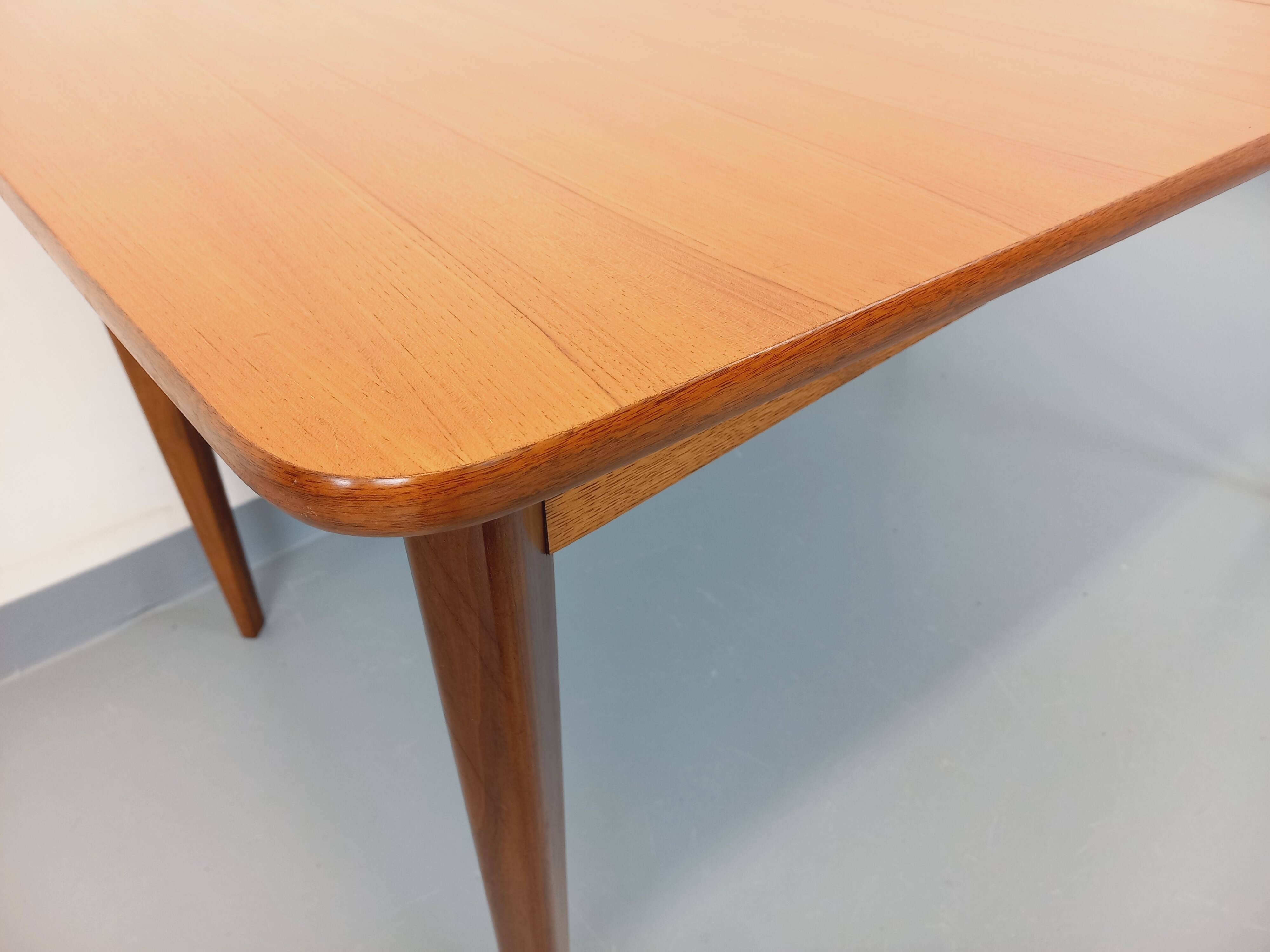 Rectangular dining table in vintage Scandinavian style from the 50s and 60s, made of teak.
