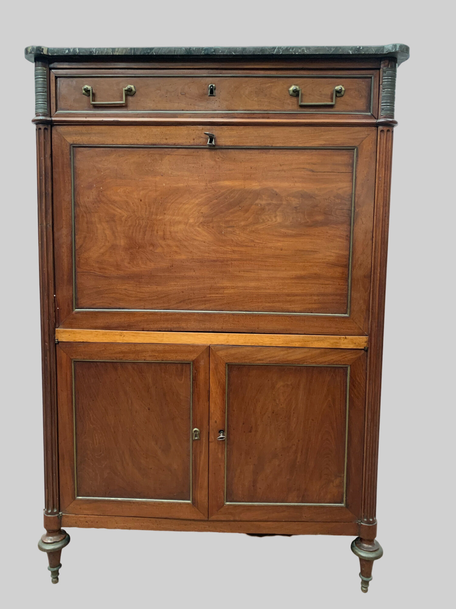 Secretary Louis XVI in mahogany Top of veined gray marble XIX century