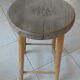 Vintage stool in patinated natural wood