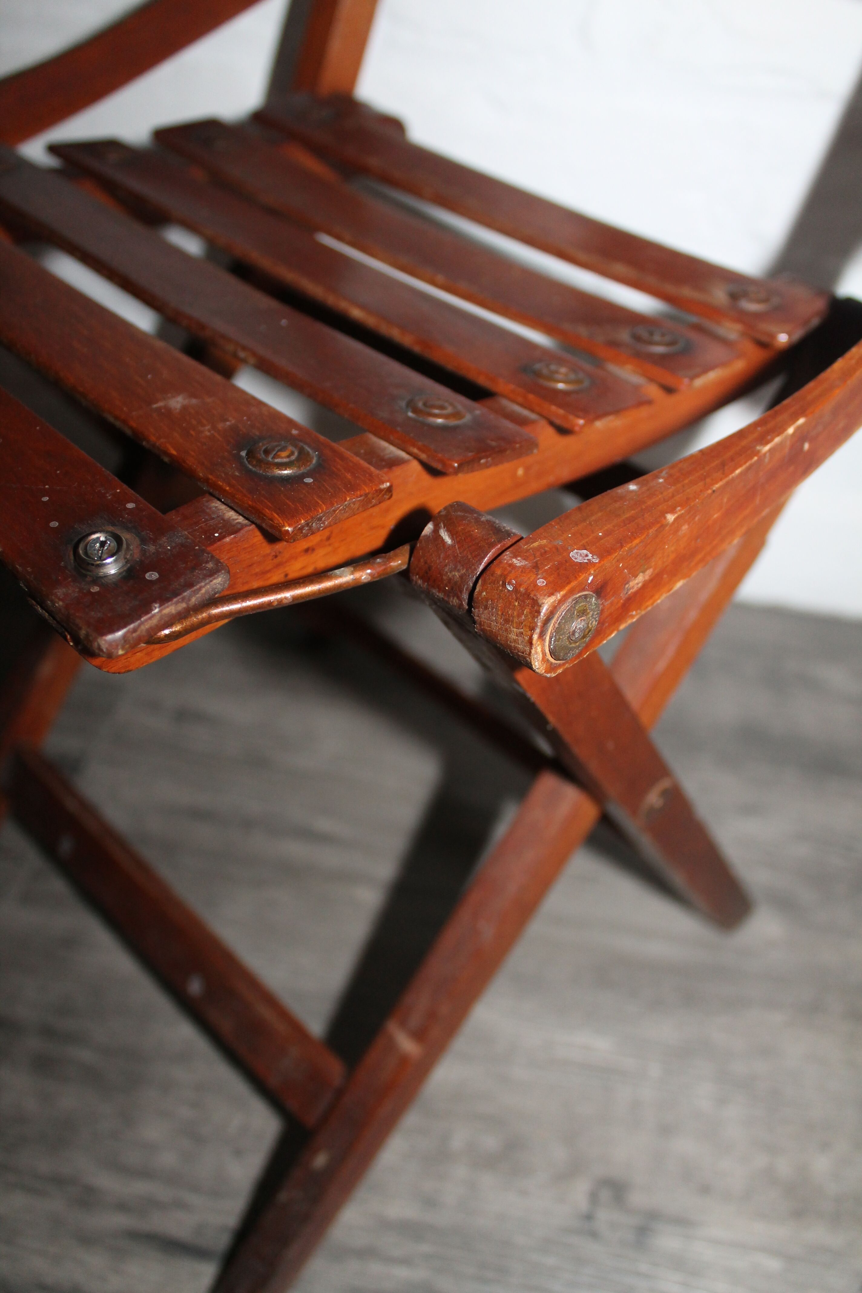 2 wooden folding chairs