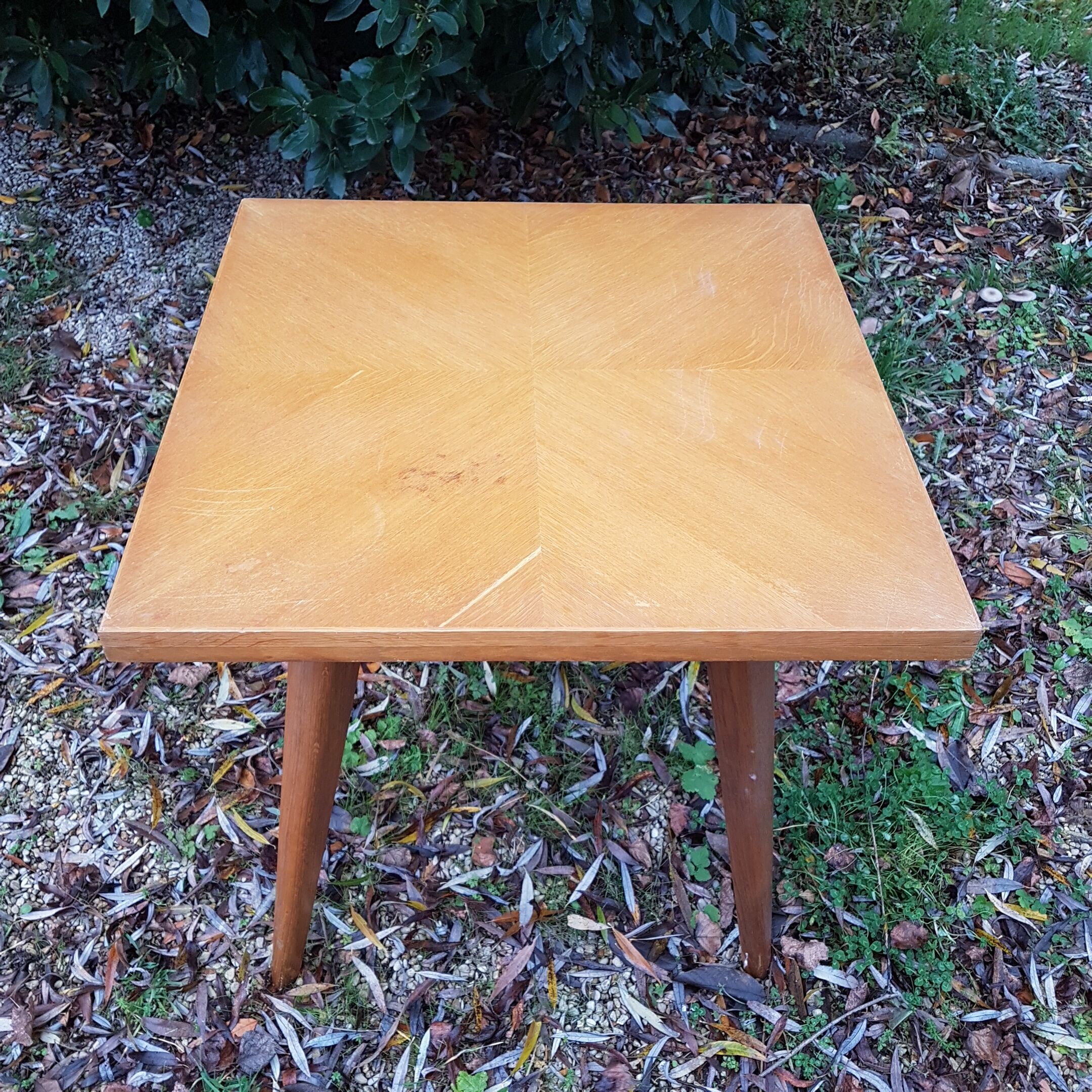 Vintage table with compass feet