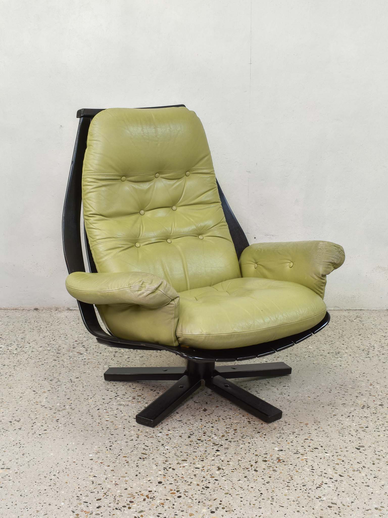 Leather swivel armchair