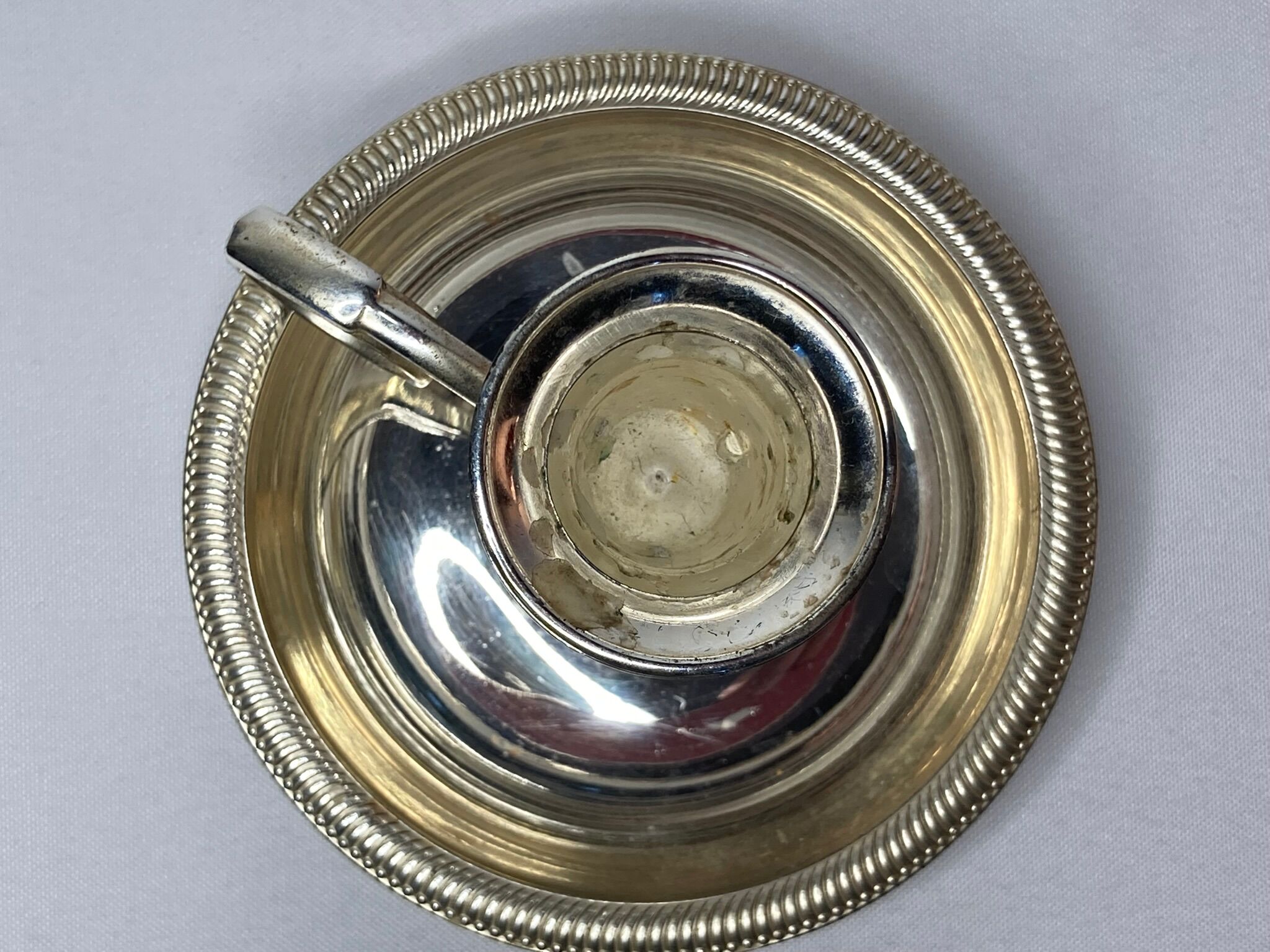 Twentieth century silver metal hand candle holder