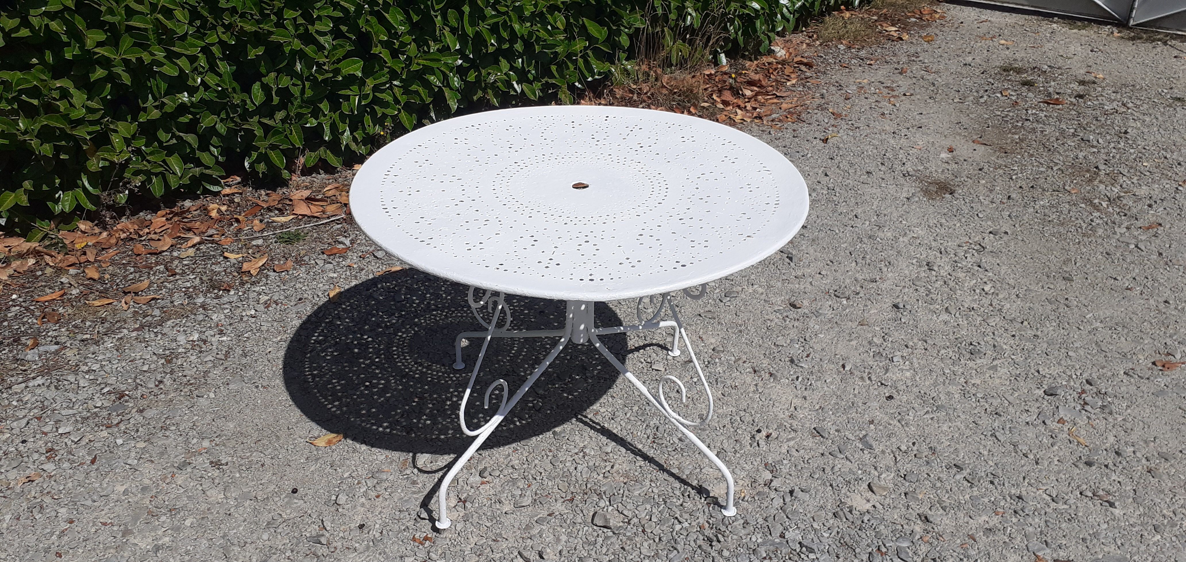 Old white wrought iron garden set