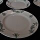 Série de six assiettes plates en faïence de Longchamp modèle Sapho