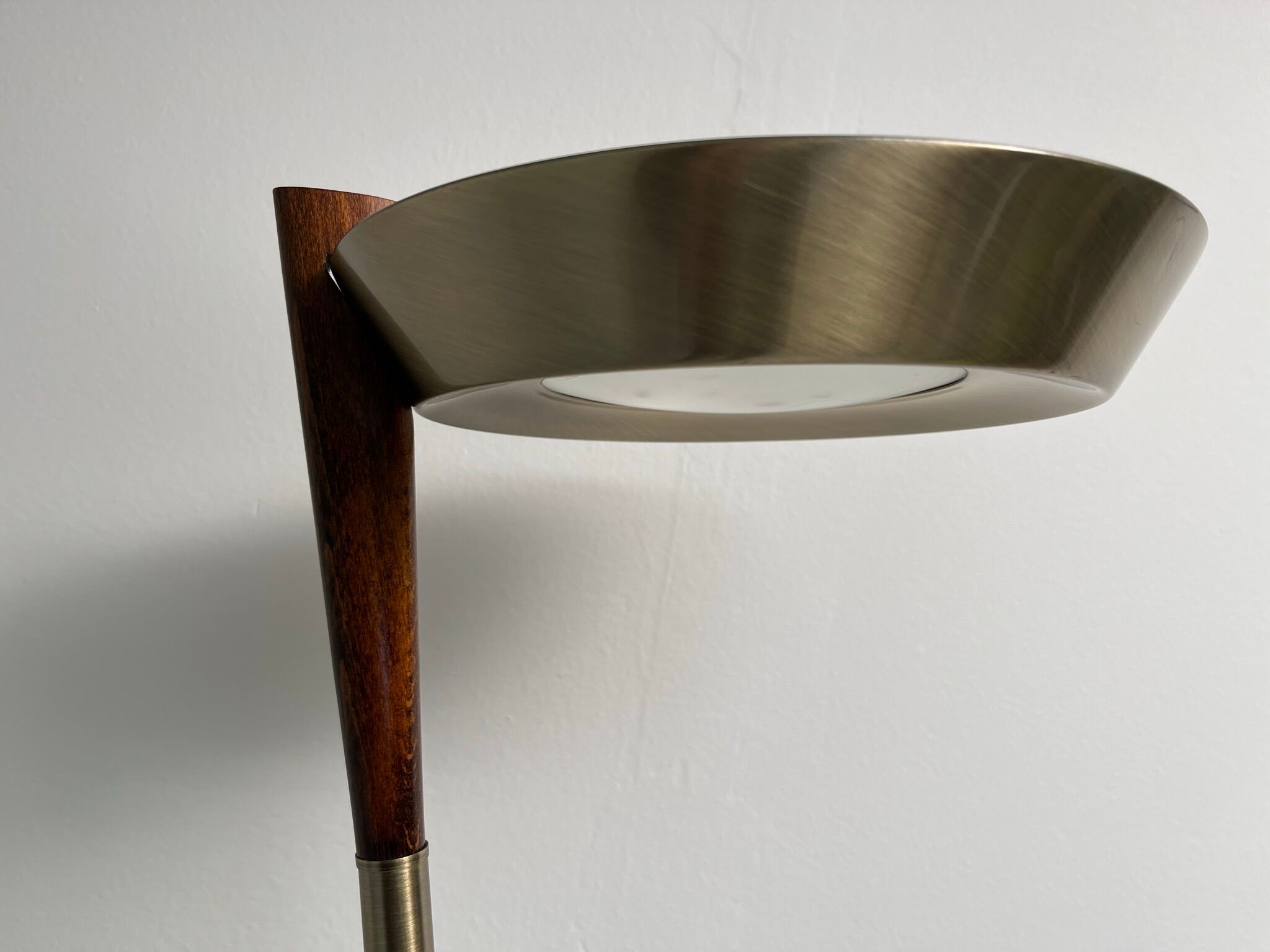 Golden metal floor lamp with reading light