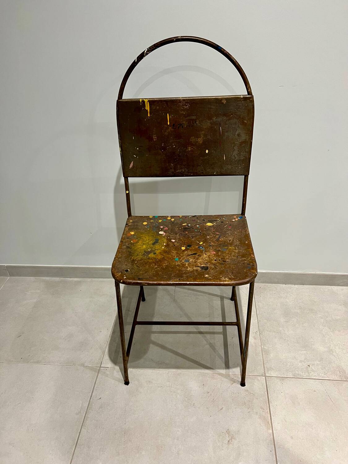 Pair of vintage raw metal chairs