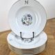 6 deep plates made of Limoges porcelain with a paradise bird design.