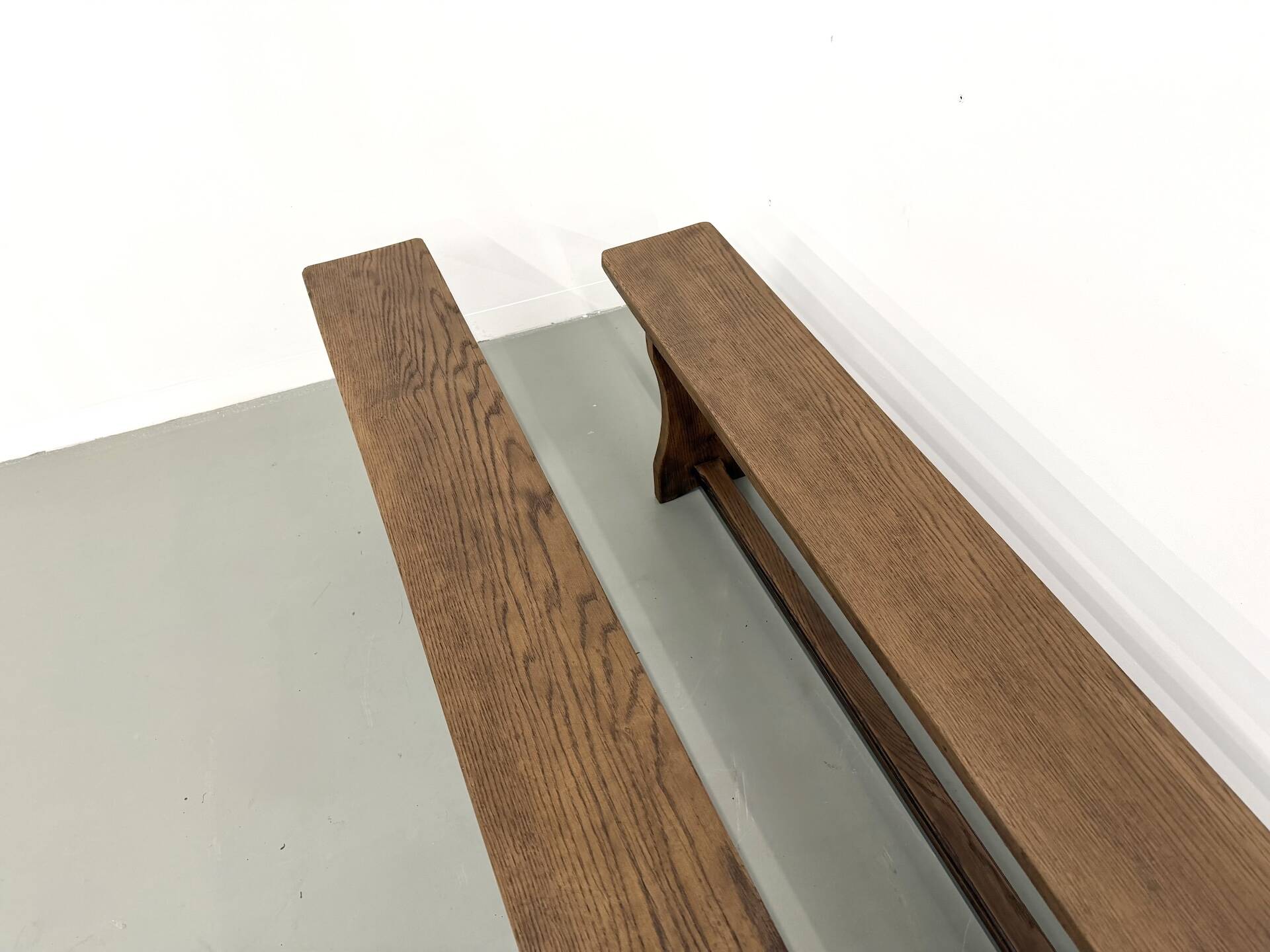 Pair of solid oak benches, winged legs, France, 1970s