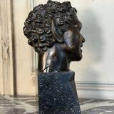 Head of a faun smiling, bronze after the antique, 19th century.