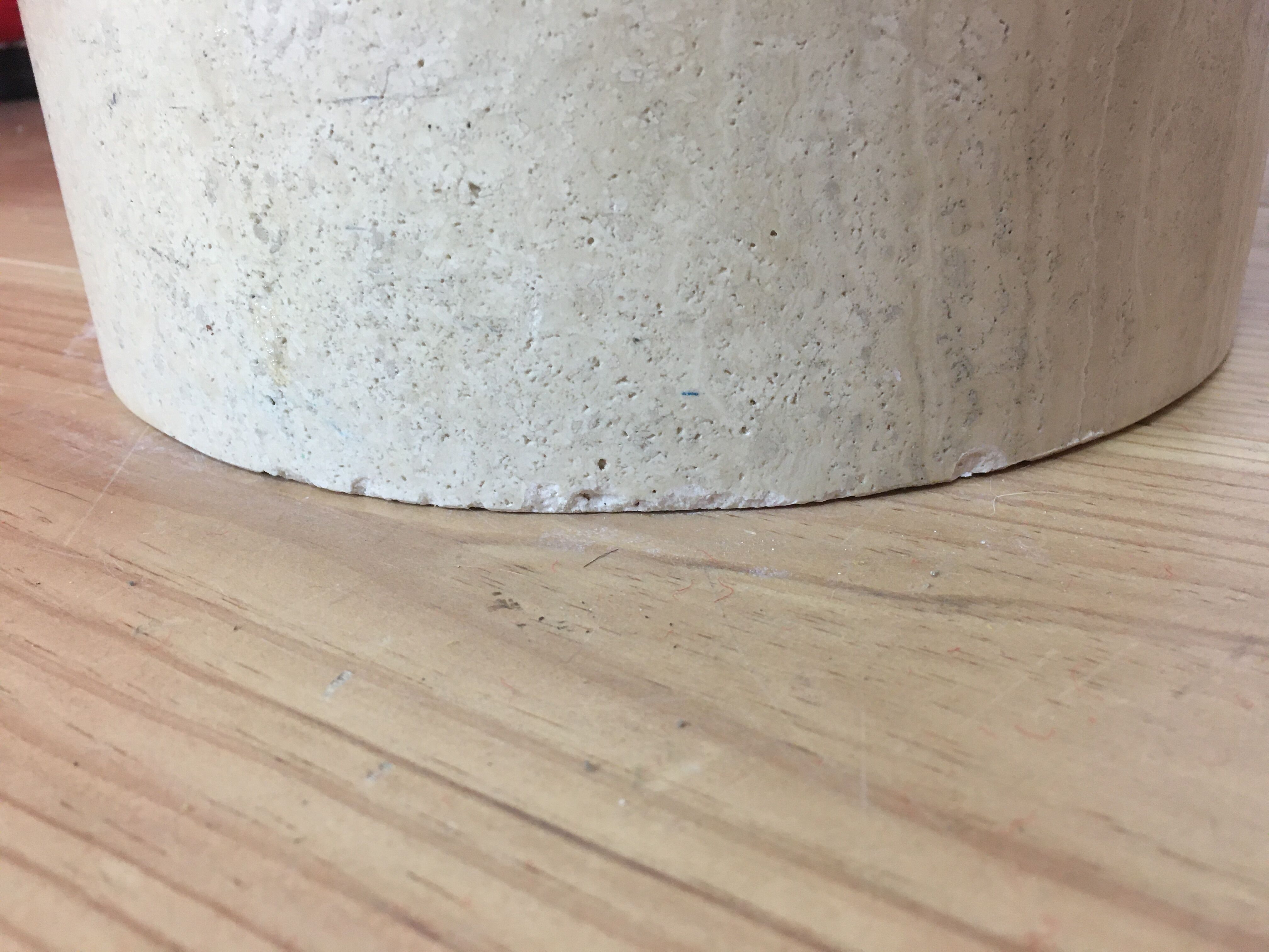 Round travertine coffee table