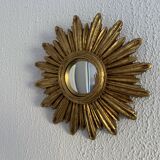 Vintage 1960s sunburst witch's eye mirror in gold - 27 cm