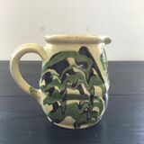 Antique pitcher of mixed earth
