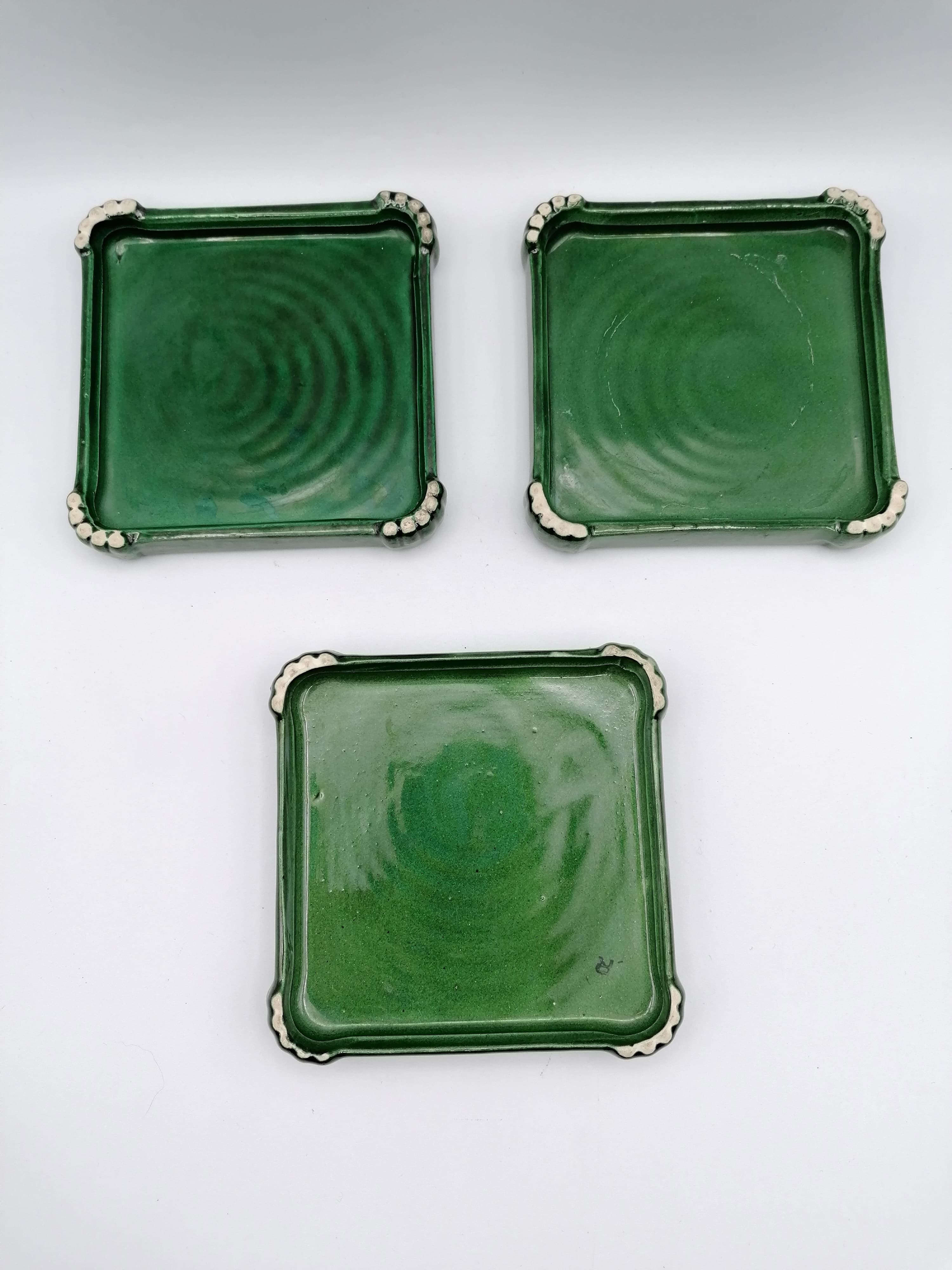 Under the plate and 3 under the bottle