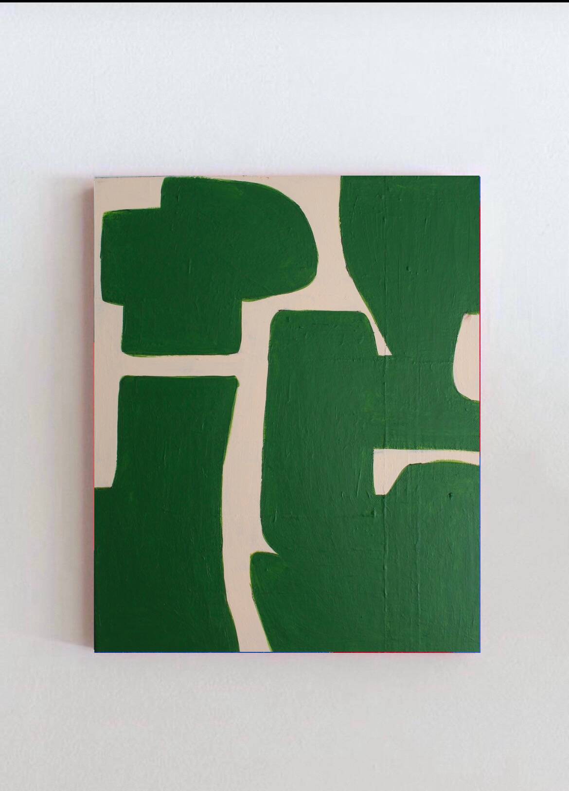 Abstract green art on a beige background.