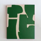 Abstract green art on a beige background.