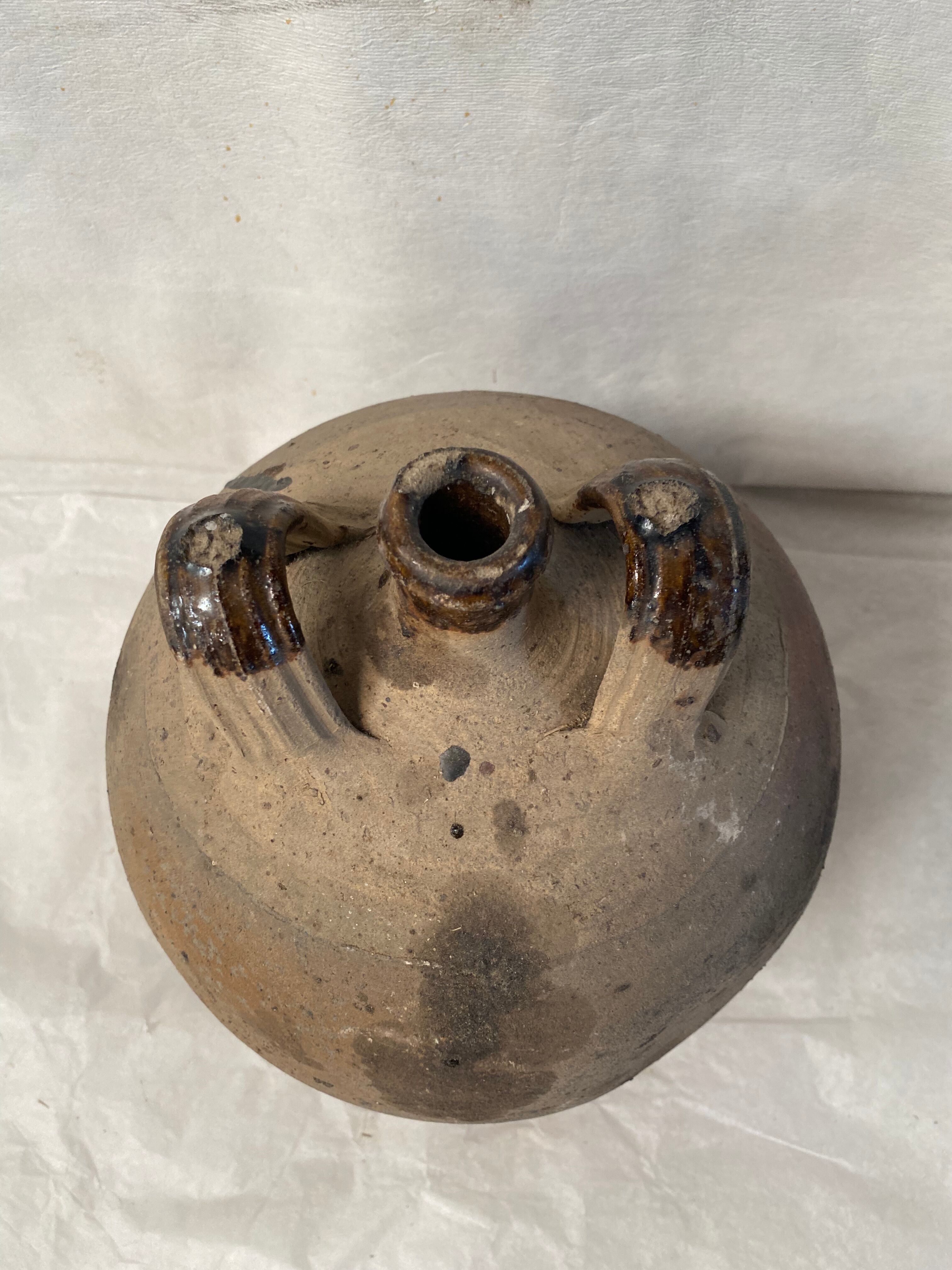 Vase jug in ancient sandstone