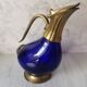 Glass and brass decanter