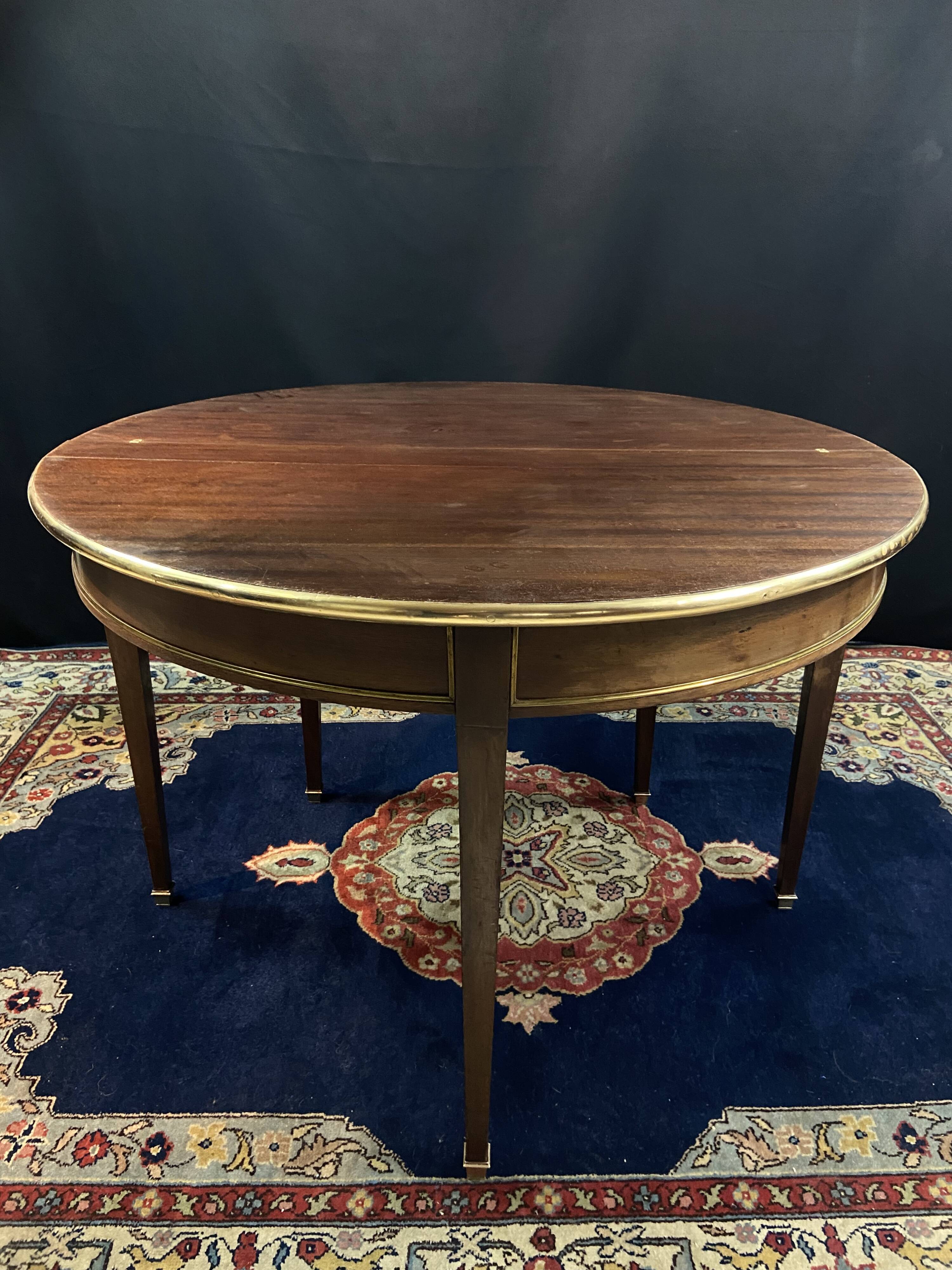 Console table demi-lune 19th century Louis XVI modular foldable top in mahogany.