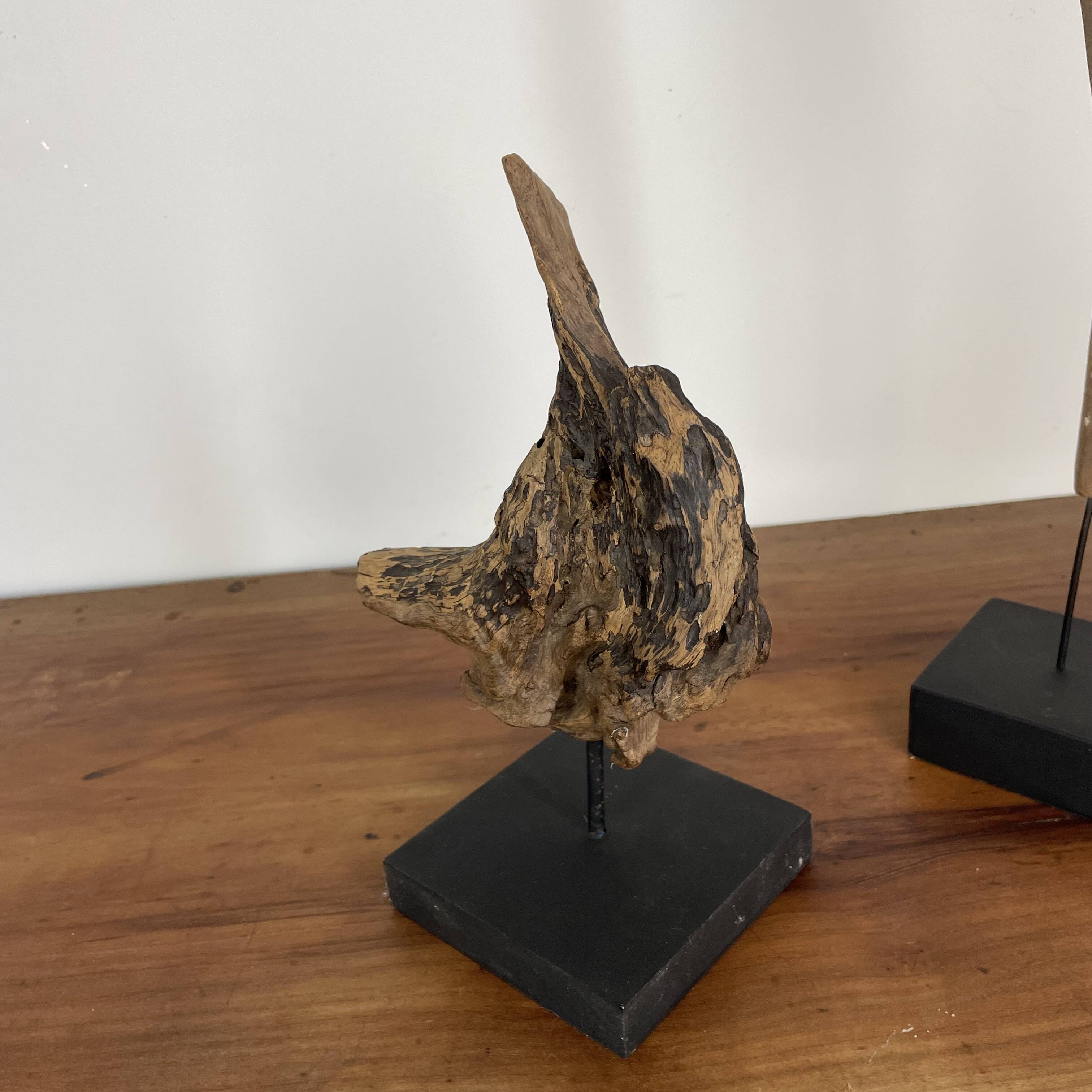 Set of 2 wooden sculptures on base