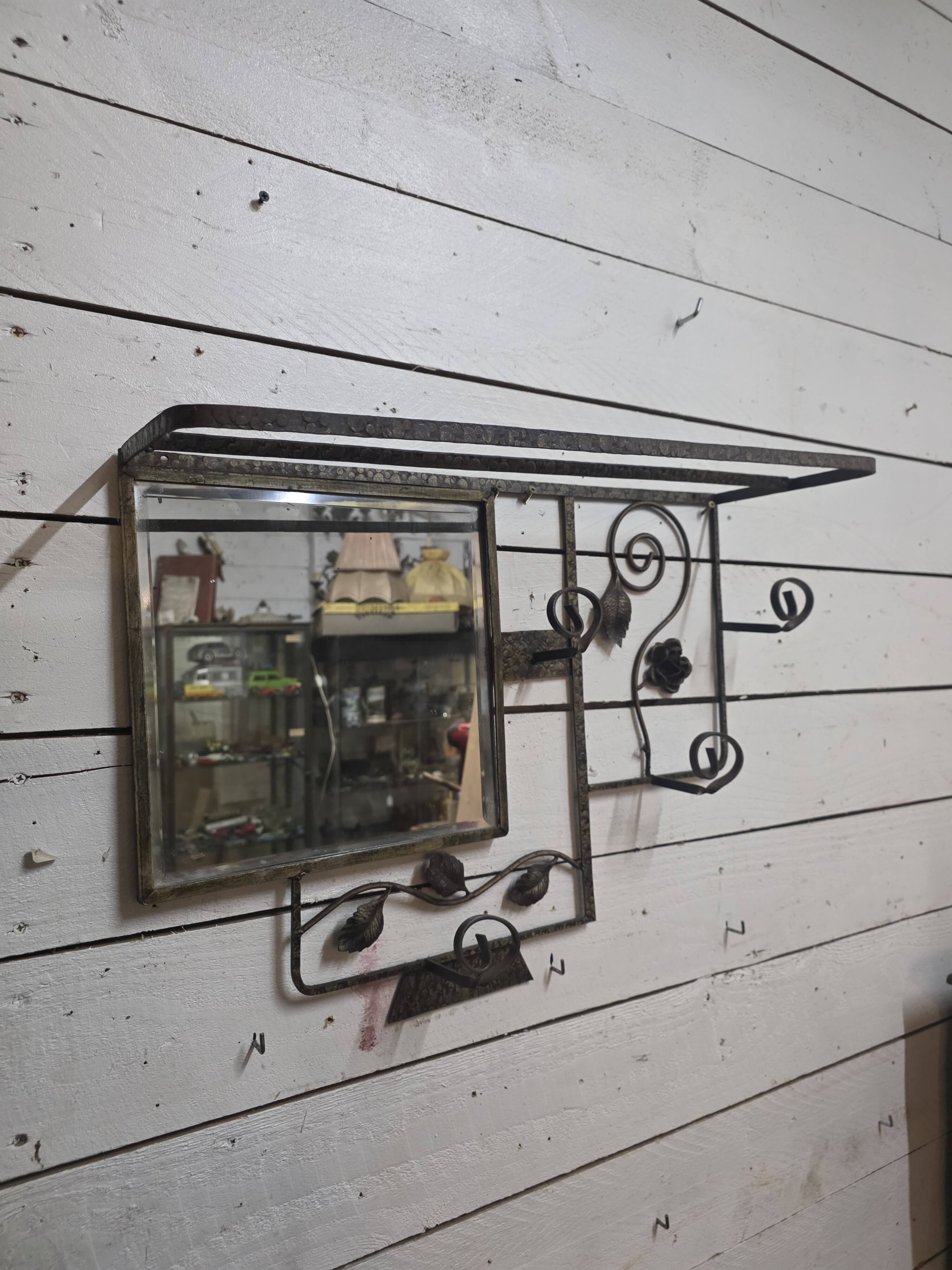 Art Deco coat rack in hammered wrought iron, 1950s.