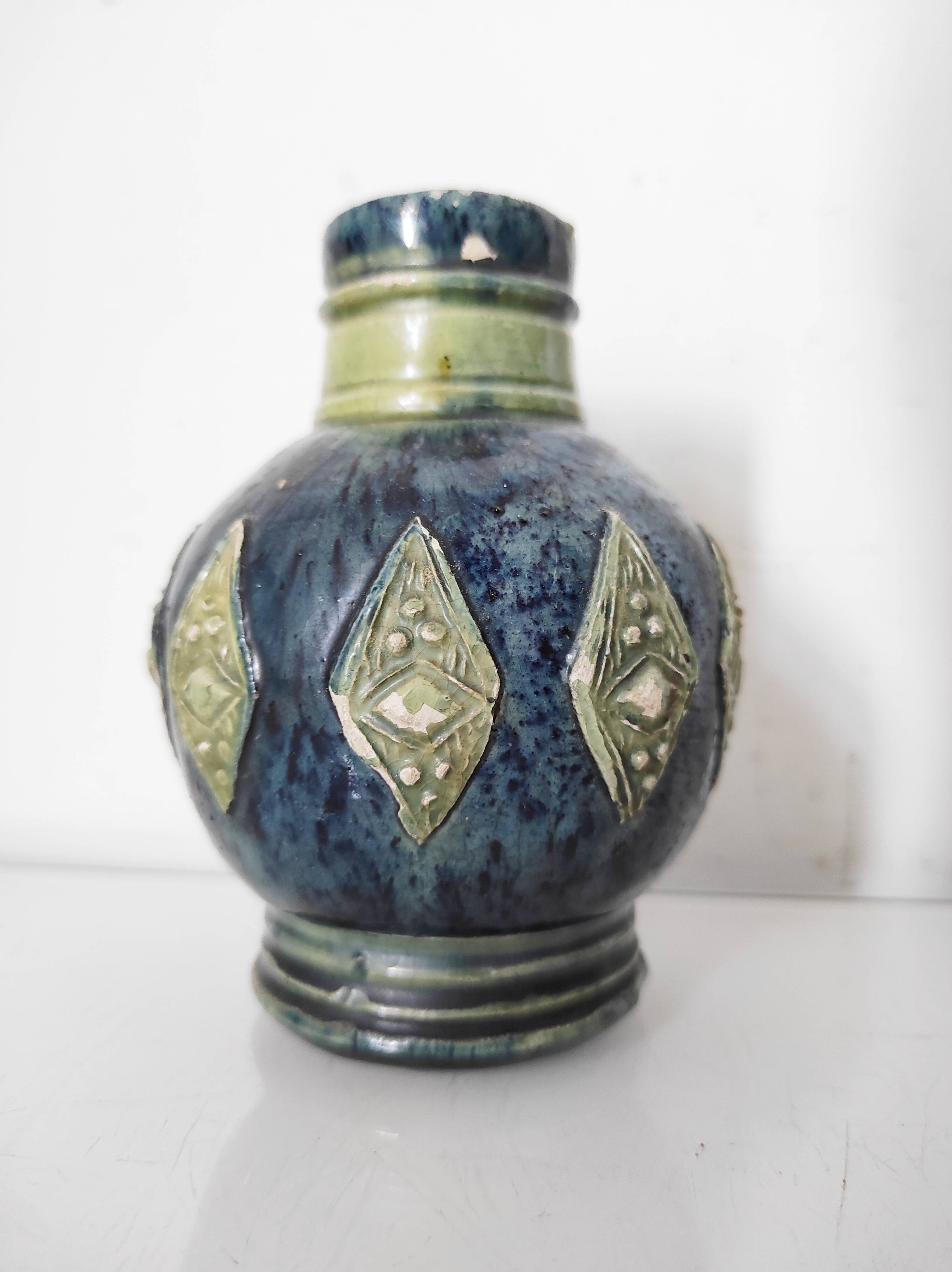 Two small blue ceramic vases