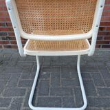 Cesca dining room chair designed by Marcel Breuer