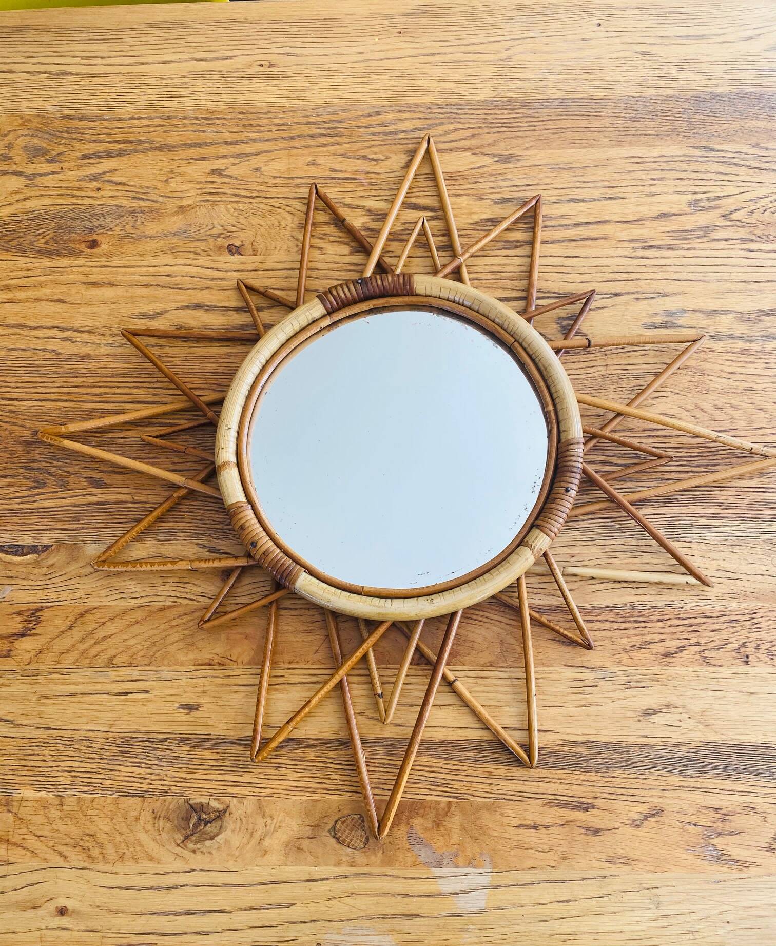 Vintage 60s/70s rattan sun mirror.