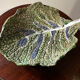 Vintage ceramic leaf-shaped vide poche, signed.