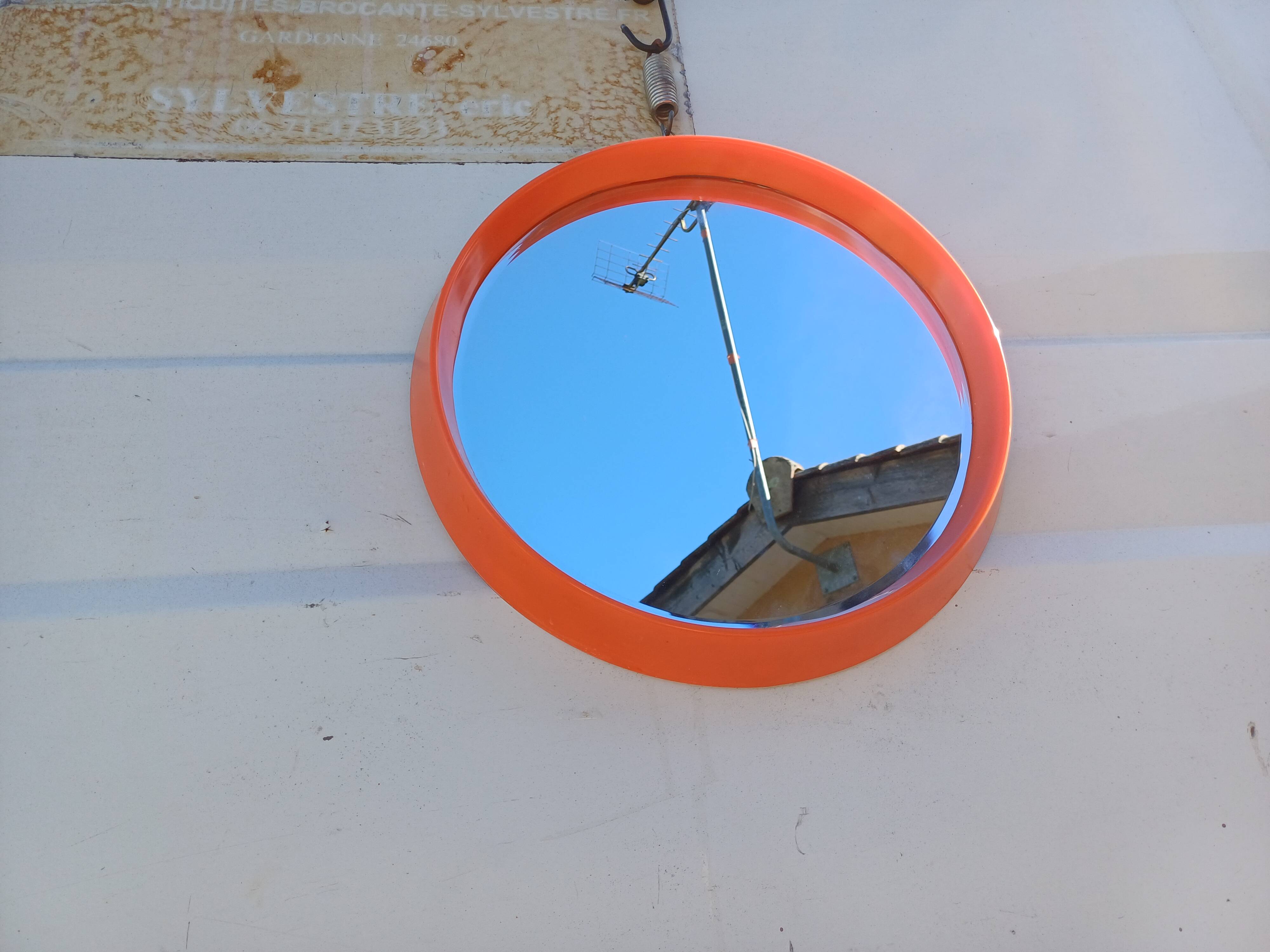 Vintage round plastic orange mirror
