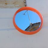 Vintage round plastic orange mirror