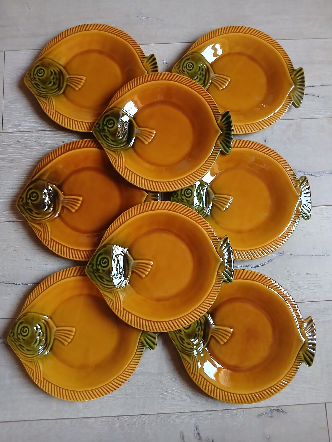 8 antique plates in majolica fish shape