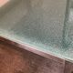 Designer garden coffee table in tempered glass and stainless steel