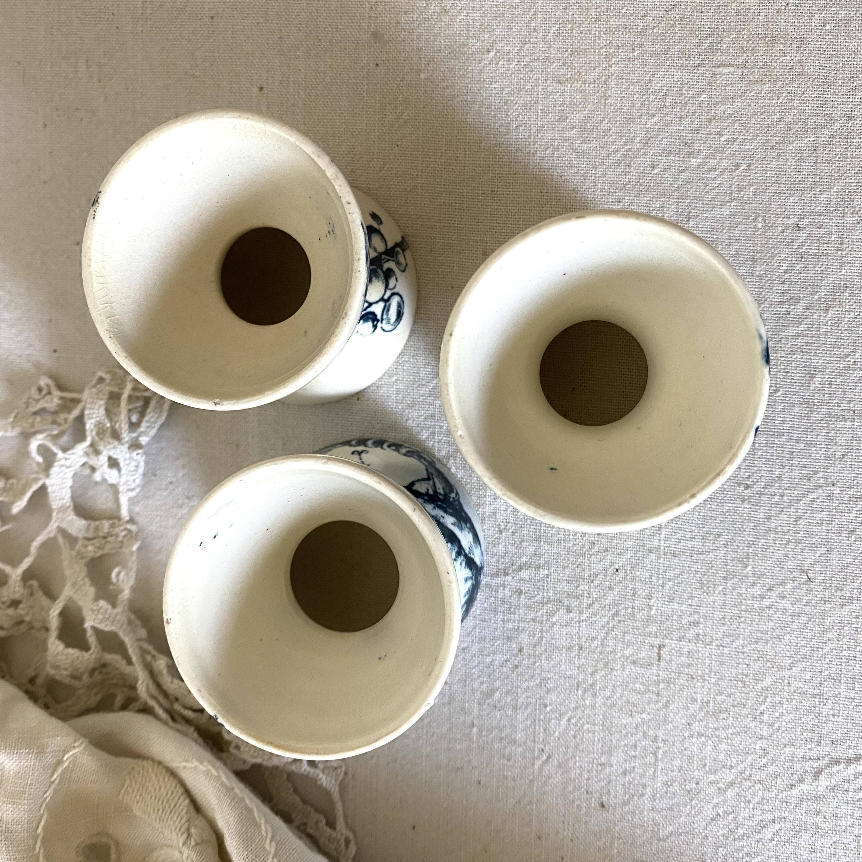 Old diabolo iron earth egg cups