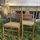 Pair of caned chairs in gilded wood