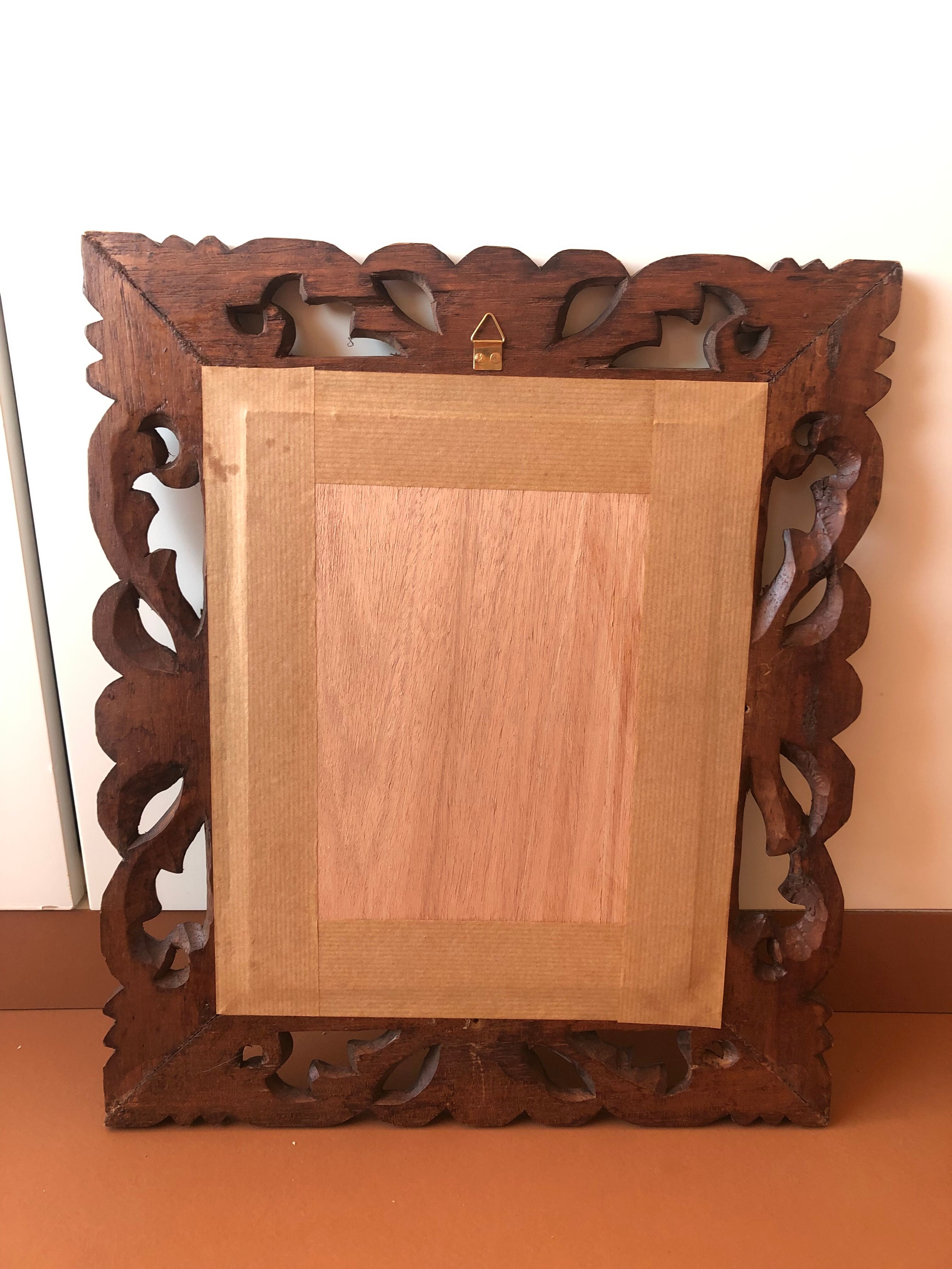 Old mirror carved wooden frame