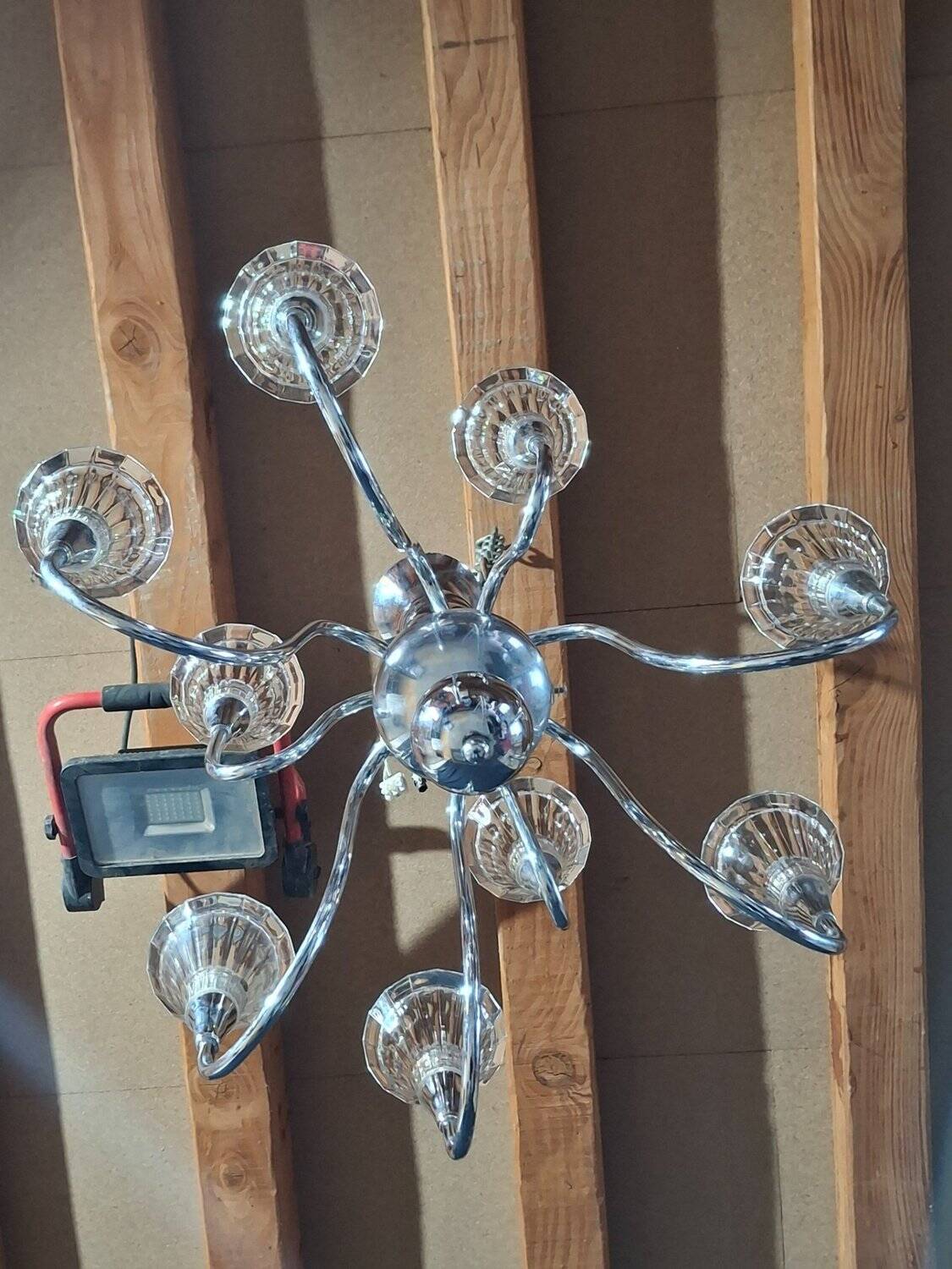 Chandelier from the 1930s to 1950s in chrome metal and thick glass.