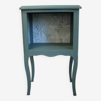 Old bedside table revamped with green Foliage wallpaper