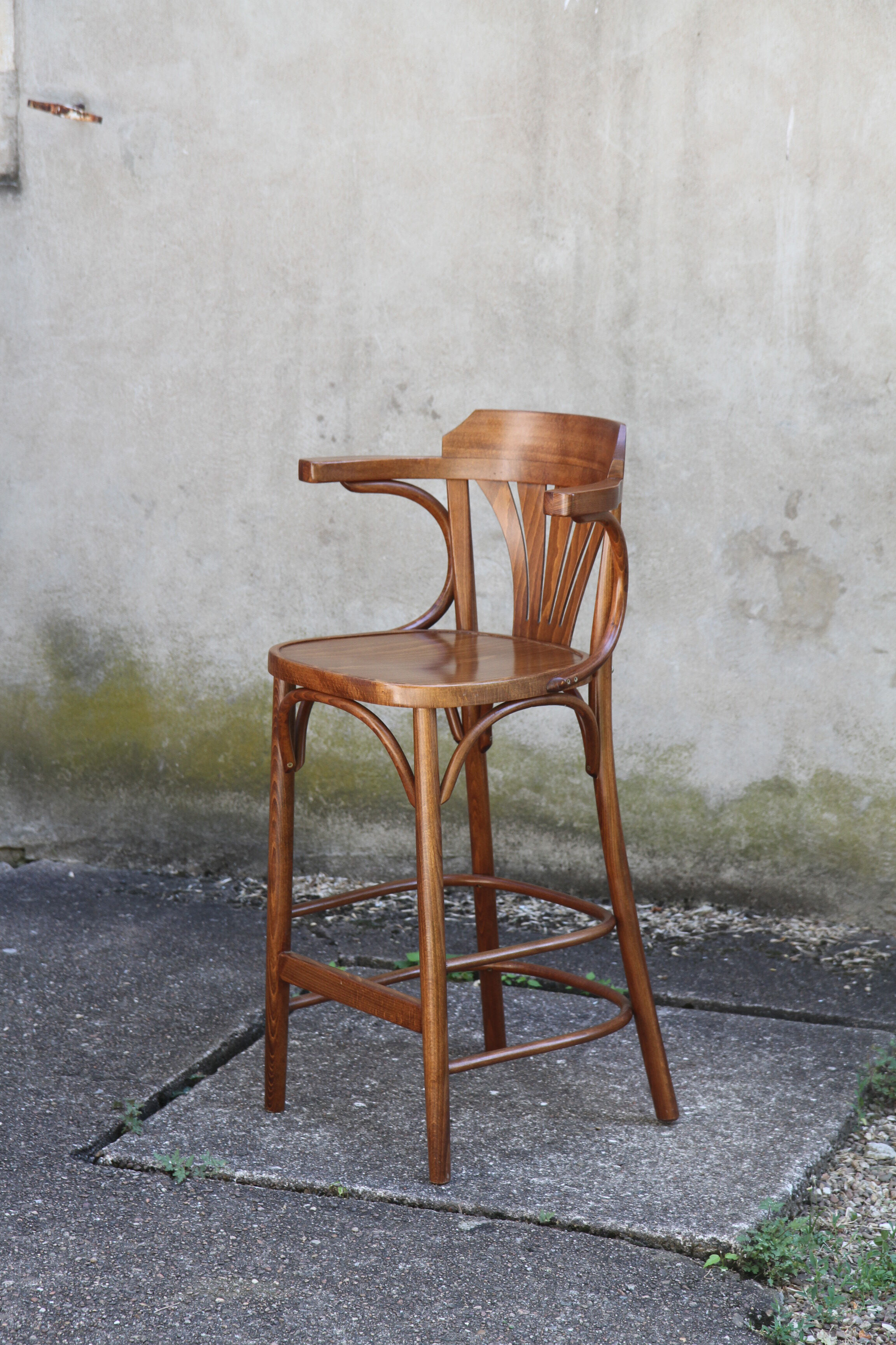High curved wooden bar chair