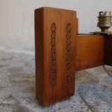 Pied de lampe en bois sculpté