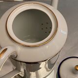 Teapot with blue and gold nets in Limoges porcelain signed Haviland